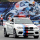 Illustration for article titled BMW X6 M Paces Laguna Seca MotoGP Race